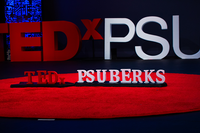 redcarpets.com-step-repeat-fabric-red-carpet-TEDxPSUBerks-round-circle-red-18-72